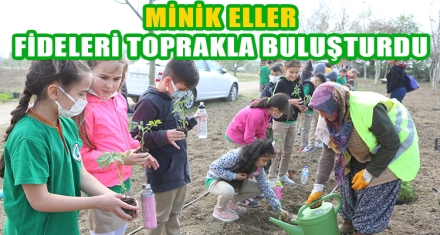 MİNİK ELLER FİDELERİ TOPRAKLA BULUŞTURDU