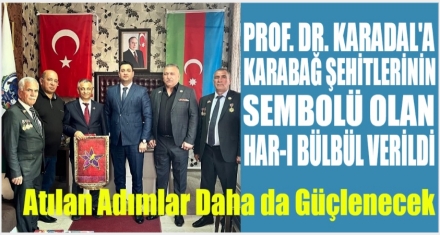 PROF. DR. KARADAL'A ONURLANDIRAN SEMBÖL
